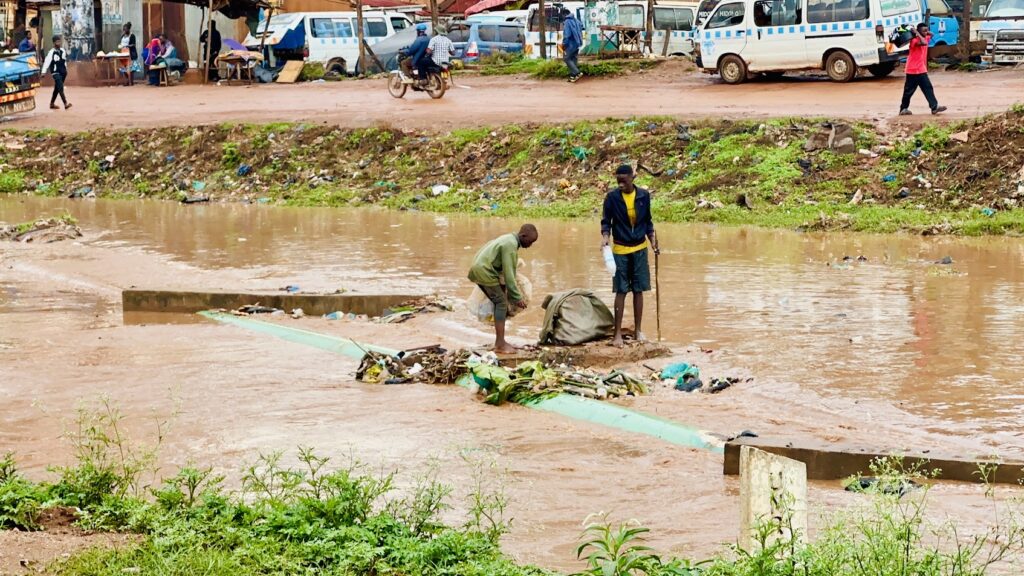 Flooded drainage channels in Kampala illustrate the risks highlighted by Uganda’s meteorological service, as the rainy season peaks between mid-April and early May.